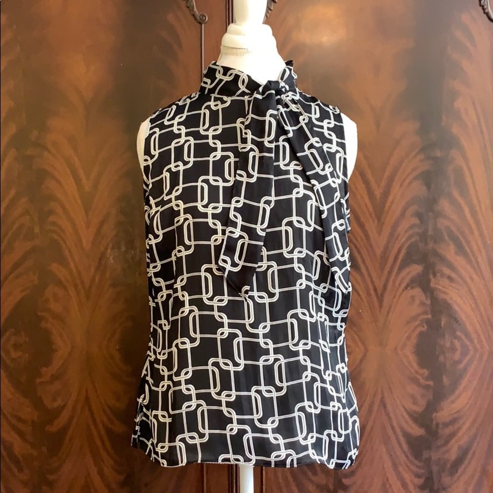 Black and white sleeveless shirt